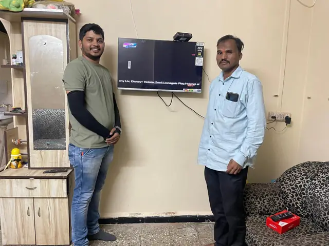 Wall-mounted TV installation